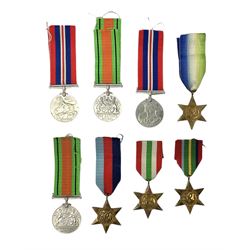 Eight WW2 medals comprising two War Medals 1939-1945, two Defence Medals, Atlantic Star, Italy Star, Pacific Star and 1939-1945 Star; all with ribbons (8) 