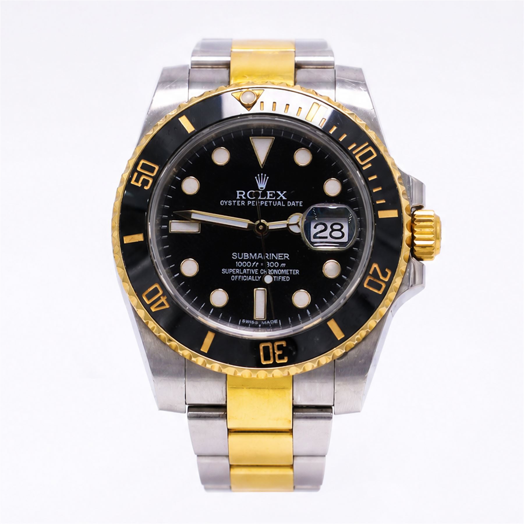 Rolex Oyster Perpetual Submariner Date gentleman's stainless steel and gold automatic wristwatch, Ref. 116613LN, serial No. 8201P7C5, back dial with luminous hour markers, unidirectional rotating black ceramic bezel, on stainless steel and yellow gold Rolex Oyster bracelet with fold-over clasp, boxed with guarantee card dated 2013