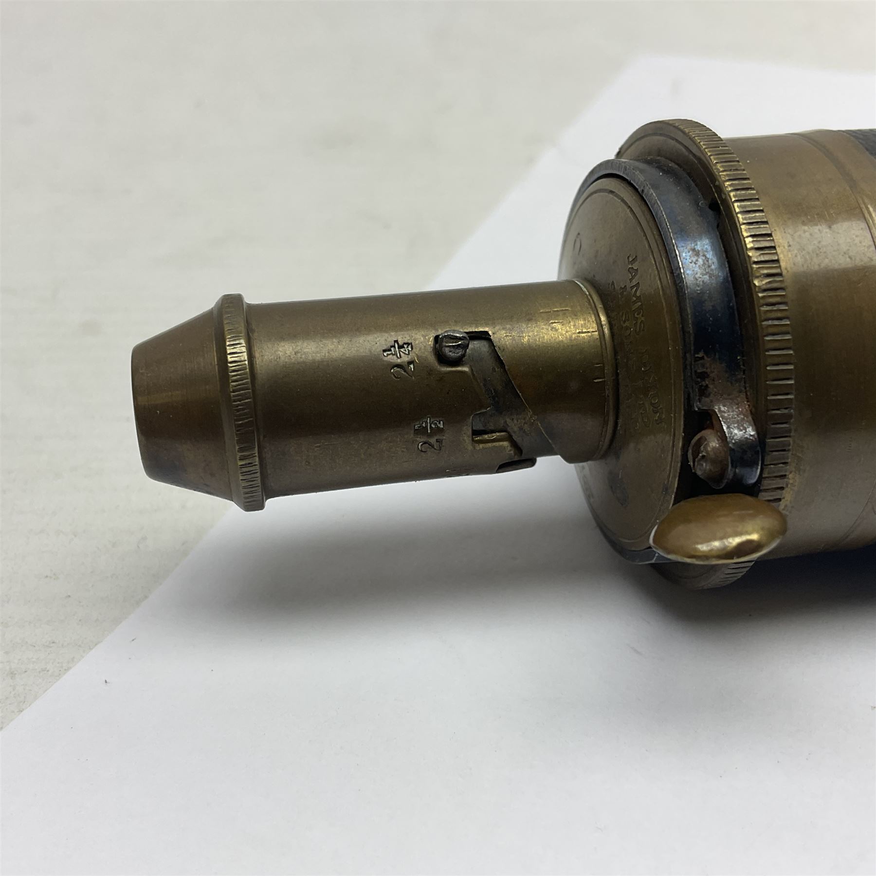 19th century James Dixon & Sons leather covered powder flask with patent action adjustable shot measure to dispense 2 1/4 - 3 drams; marked Parker Hale Ltd. Birmingham England L20cm