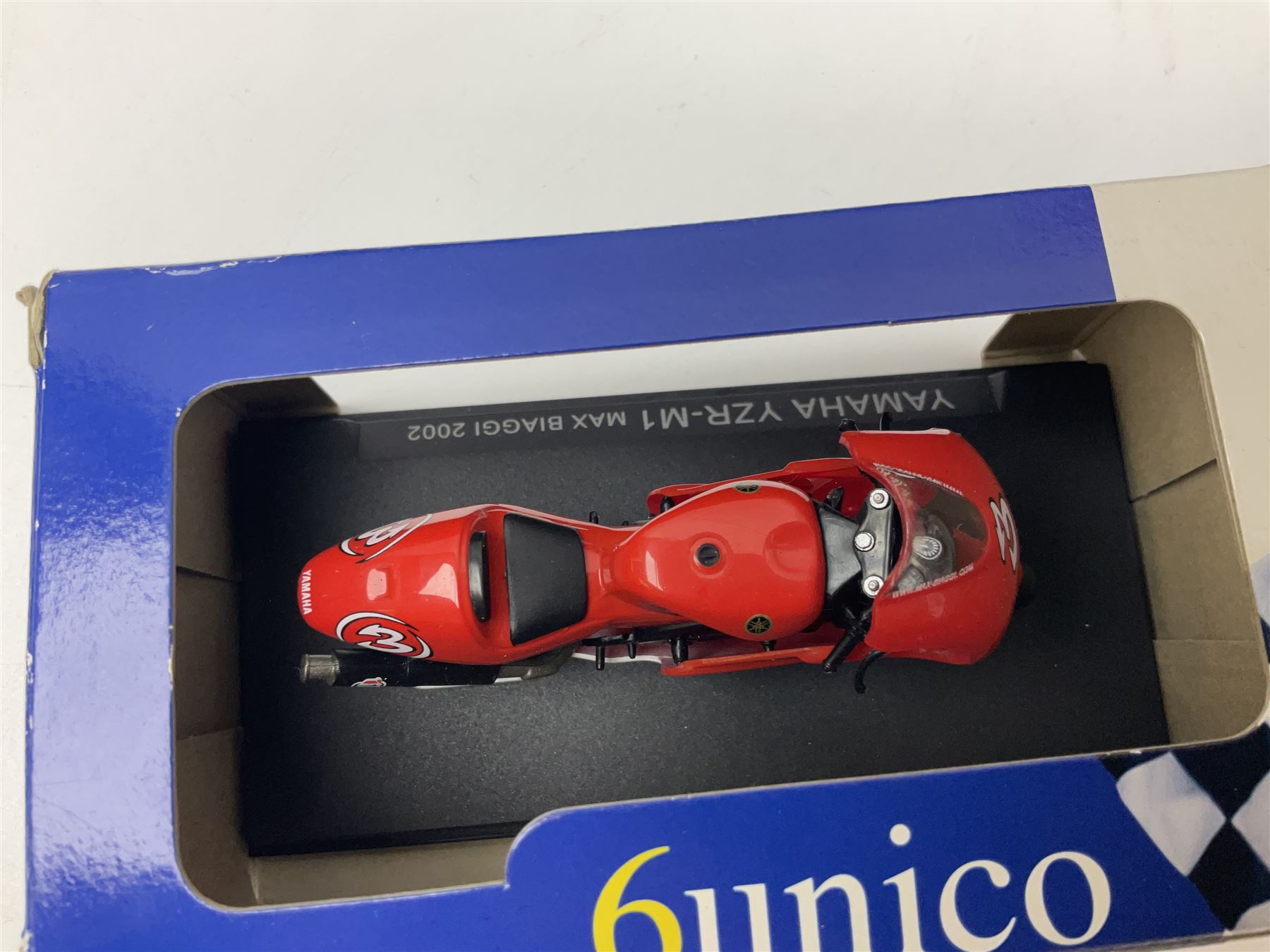 Fifty-one die-cast models of motorcycles by Maisto, Protar Italeri, Welly etc; many in perspex display boxes, some in window boxes and some unboxed