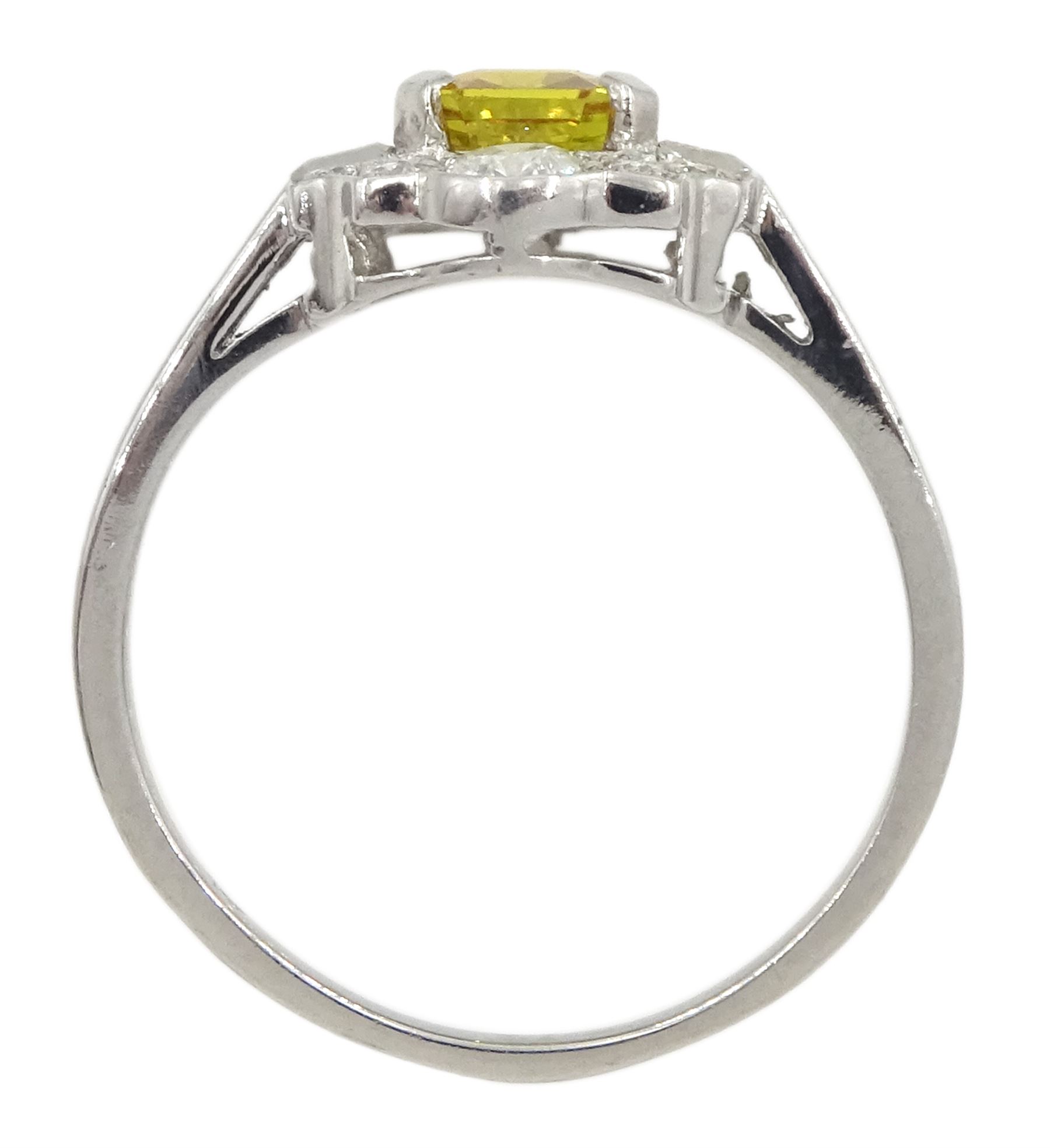 Platinum emerald cut yellow sapphire, baguette and round brilliant cut diamond cluster ring, stamped Plat, sapphire 1.30 carat, total diamond weight 0.55 carat, with World Gemological Institute Report