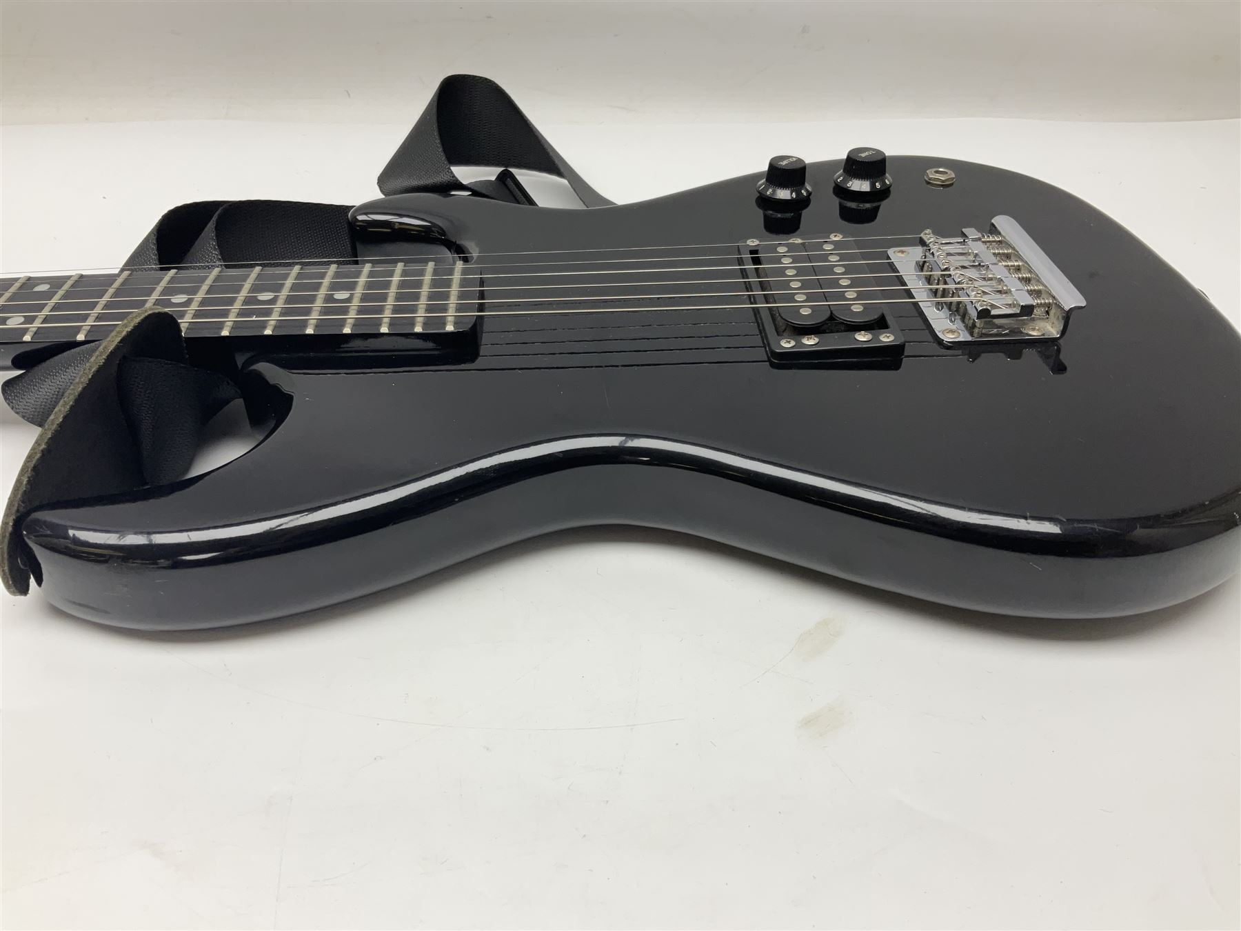 Encore black electric cut-away guitar L96cm; and Spanish Victor Garcia model 187 acoustic guitar, bears label dated 1972 L99cm; each in soft carrying case (2)