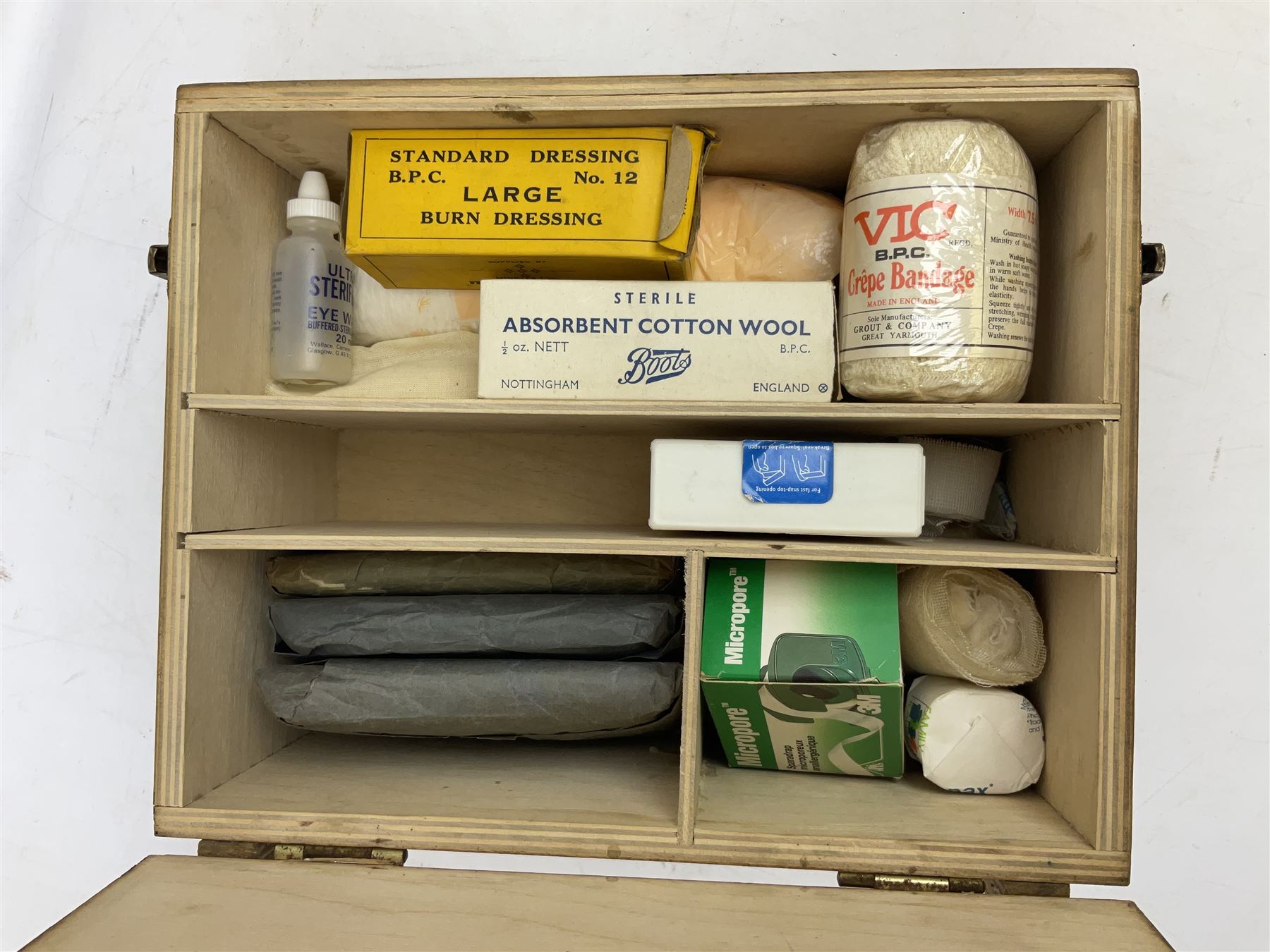 Victorian walnut box with Tunbridge ware banding and mother-of-pearl inlay, W29.5cm H14cm, together with first aid kit box and Group of early 20th century ornate gold plated (tested) and gilt brooch frames and panel fronts