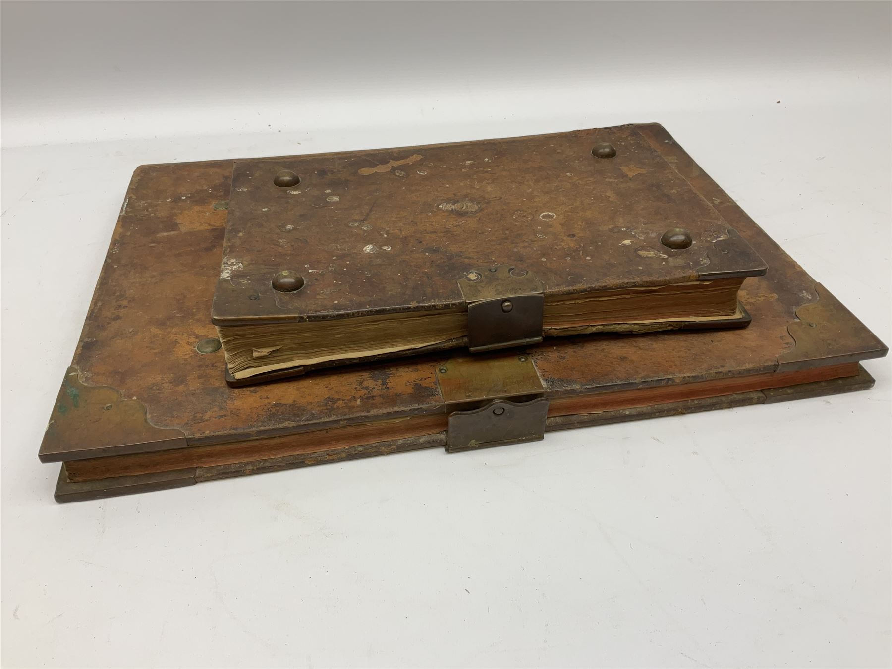 Six 19th century leather bound books of music comprising Graduale Juxta Missale Romanum and Antiphonarium Romanum. Both 1828 Divione; Graduel Romain and Psautier Romain. Both 1859 Digne/Paris; Graduel Romain. 1872 Marseille; and Missale Romanum. 1853 Mechliniae (6)