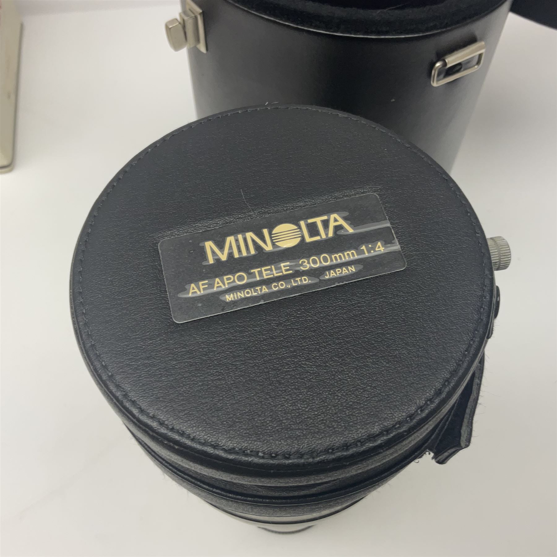 Minolta Dynax 7 camera body, serial number 93101009, Minolta 'AF APO Tele 300mm 1:4 (32)' lens serial no 32501041, in case and other camera equipment 