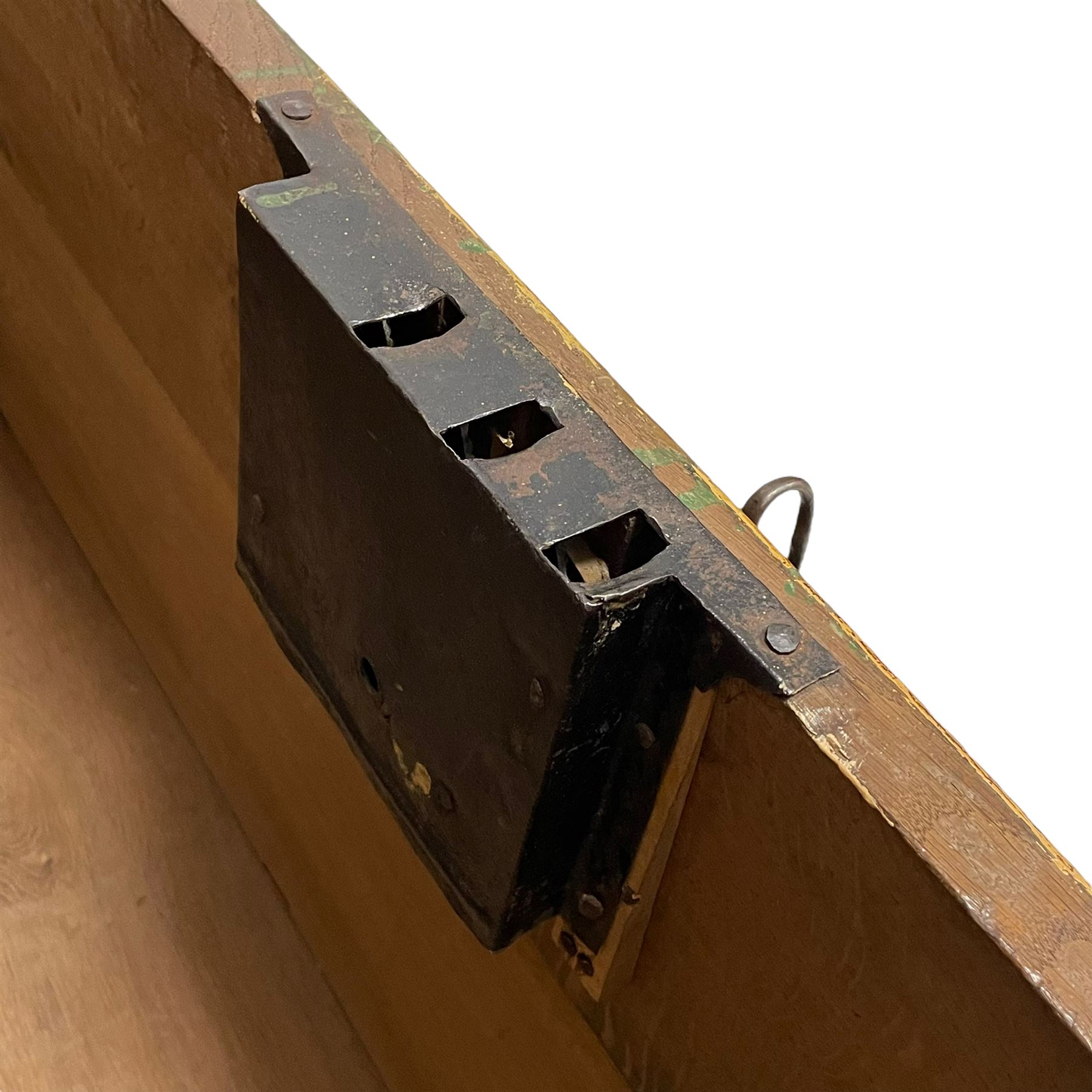 19th century painted oak sea chest, hinged dome top enclosing small compartment, bound by shaped and pressed metal strapwork, scumbled finish to resemble oak and painted with small vignettes depicting portraits and landscapes within panels, fitted with large wrought metal carrying handles, the front inscribed 'H.J.S. 1870' 