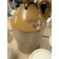 19th century sage green apothecary jars with gilt labels, four white ceramic kitchen jars and a stoneware flaggon marked Wheat Wine