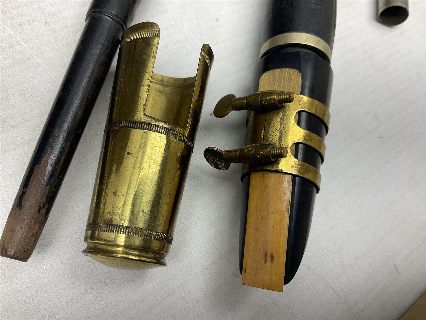 Disassembled early 20th century Boys Brigade snare drum D37cm with copy WW1 period photograph of the Kirbymoorside Boys Brigade; early 20th century hardwood clarinet; bagpipes chanter; and Dulcet E-flat penny whistle