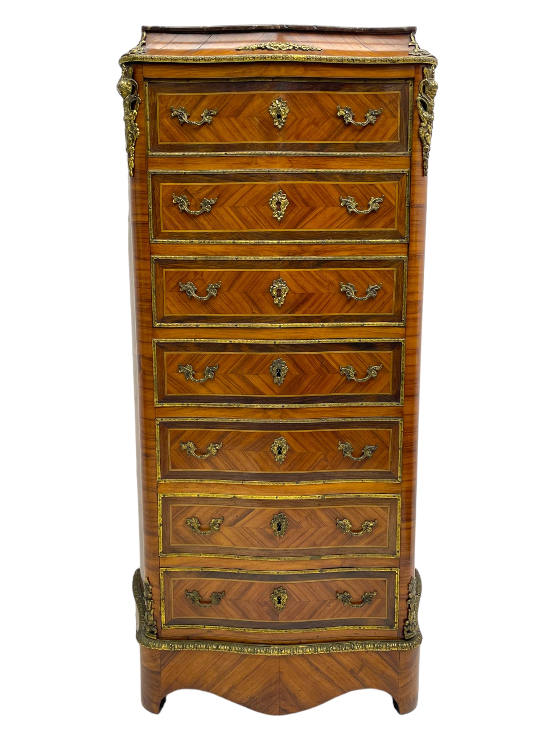 Mid-20th century Louis XVI design Kingwood and walnut secretaire à Abattant, shaped serpentine form with dark rouge variegated marble top, the fall front disguised as three drawers enclosing birdseye maple interior with shelf, drawers and writing surface, four functioning drawers below, decorated with cast gilt metal mouldings and mask cartouches, on skirted base with egg and dart moulded gilt metal edge