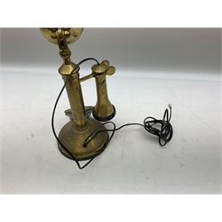 Stick brass telephone, with a ring dial in a circular base with G.E.C marked to the front, together with cable telephone with external bell