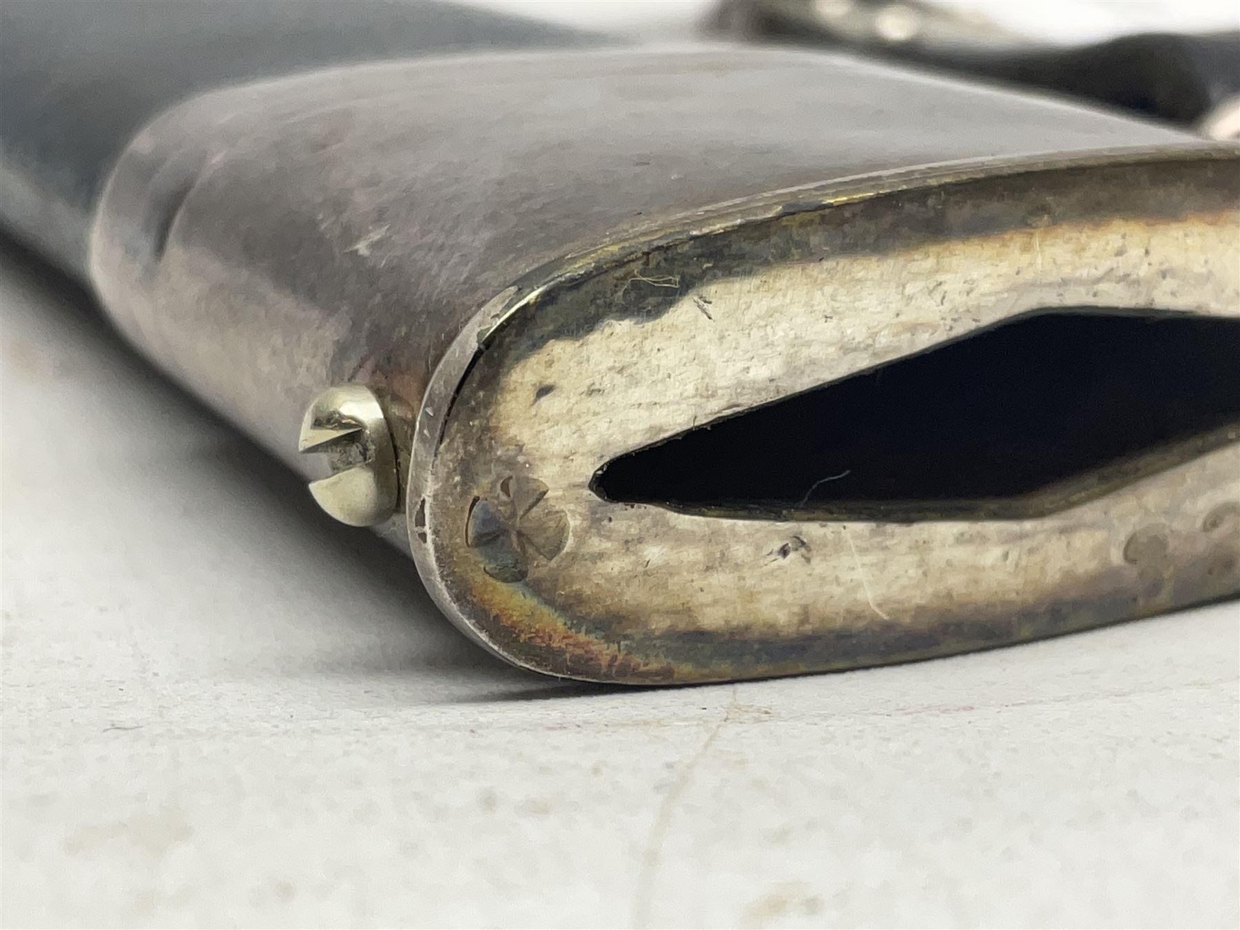 German Paul Weyersberg & Co Solingen DLV flyers dagger with 18cm steel blade, plated brass/tombac downswept cross-piece and pommel and leather covered grip, in leather and plated brass/tombac scabbard with leather hanger strap and silvered knot L35cm overall. Auctioneer's Note: After WWI Germany was forbidden an air force by the Treaty of Versailles however the Deutscher Luftsport-Verband (German Air-sport Association) was formed in March 1933 from various sports flying clubs and had branches for aeroplane, gliding and balloon flying. Under cover of the sporting DLV, many future Luftwaffe pilots trained to fly. DLV was embodied with the NSKK in March 1935 and on 1st March 1937 Luftwaffe was formed.