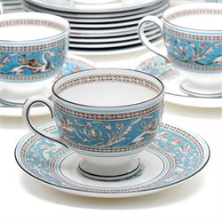 Wedgwood turquoise Florentine part service, comprising large covered tureen and stand, coffee pot, teapot, two covered sucriers, milk jug, two sauce boats and stands, seven soup plates, three bowls, jug, eighteen soup bowls and fifteen stands, two ashtrays, thirteen further saucers, twelve teacups and eleven saucers, and twenty-one further plates of varying sizes