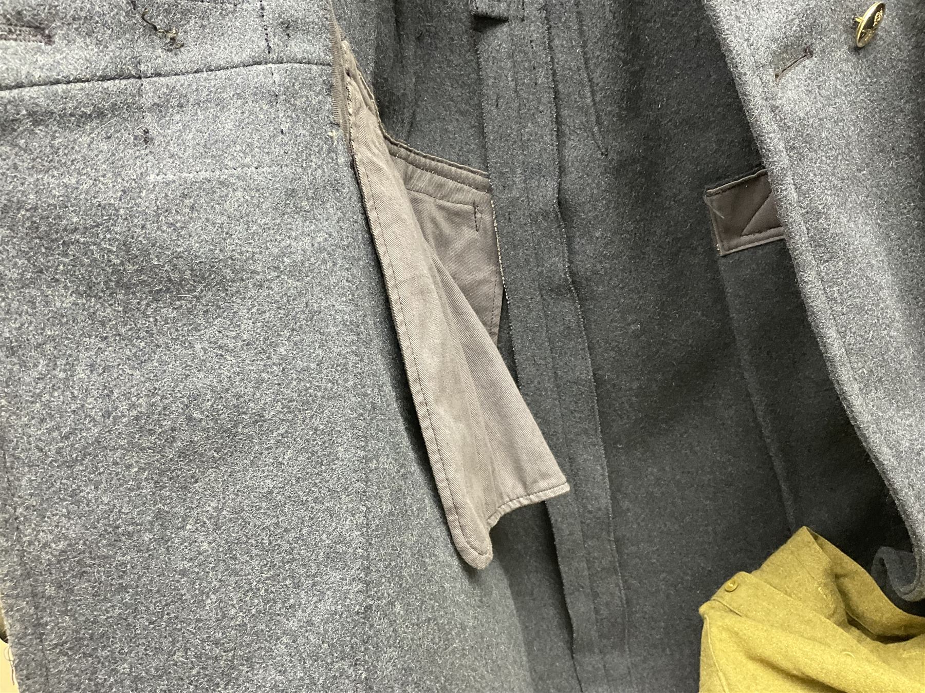 Two post-WWII British Army No.2 Dress tunics, one with Green Howards buttons; army shirt dated 1951; Royal Fleet Auxilliary jacket with trousers; three RAF/WAAF uniforms and RAF Greatcoat; and three canvas/webbing bags, two dated 1943 & 1945