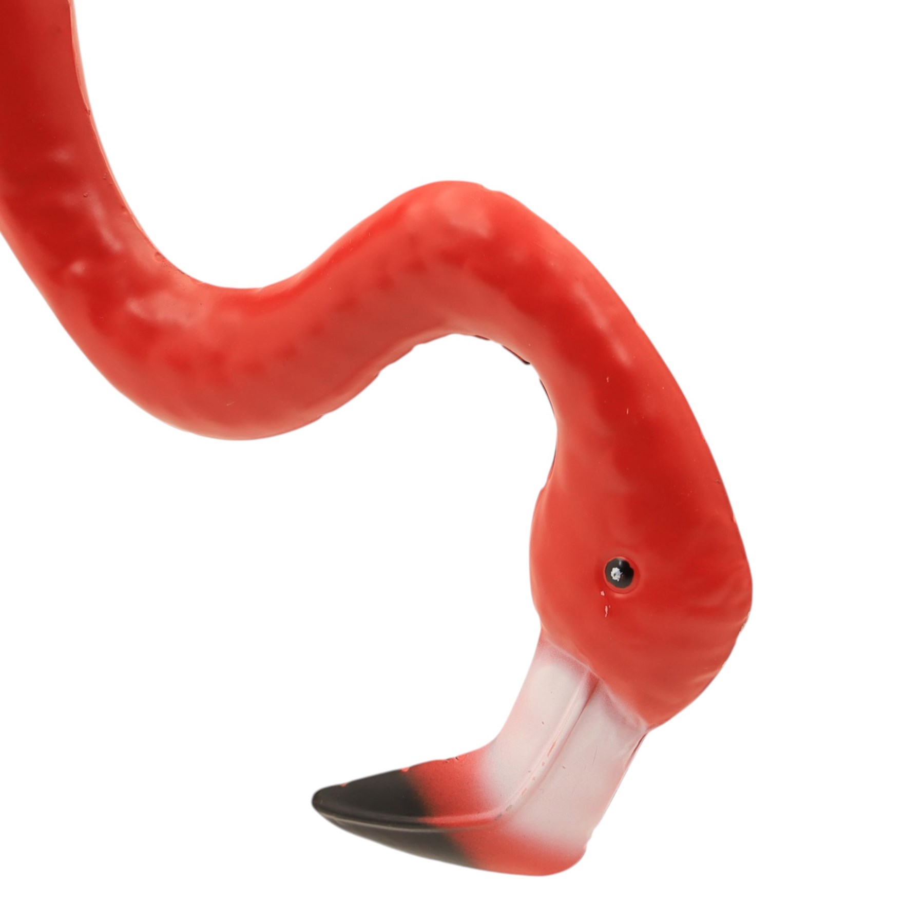 Pair of contemporary pink painted metal flamingos, with elongated curved necks, black-tipped beaks and overlapping pierced metal plumage, on long slender legs terminating in three-toed feet, modelled in differing poses