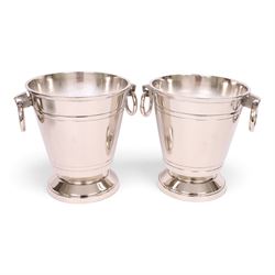 Pair champagne/ wine coolers, each with ring handles, upon a stepped circular base, H28cm