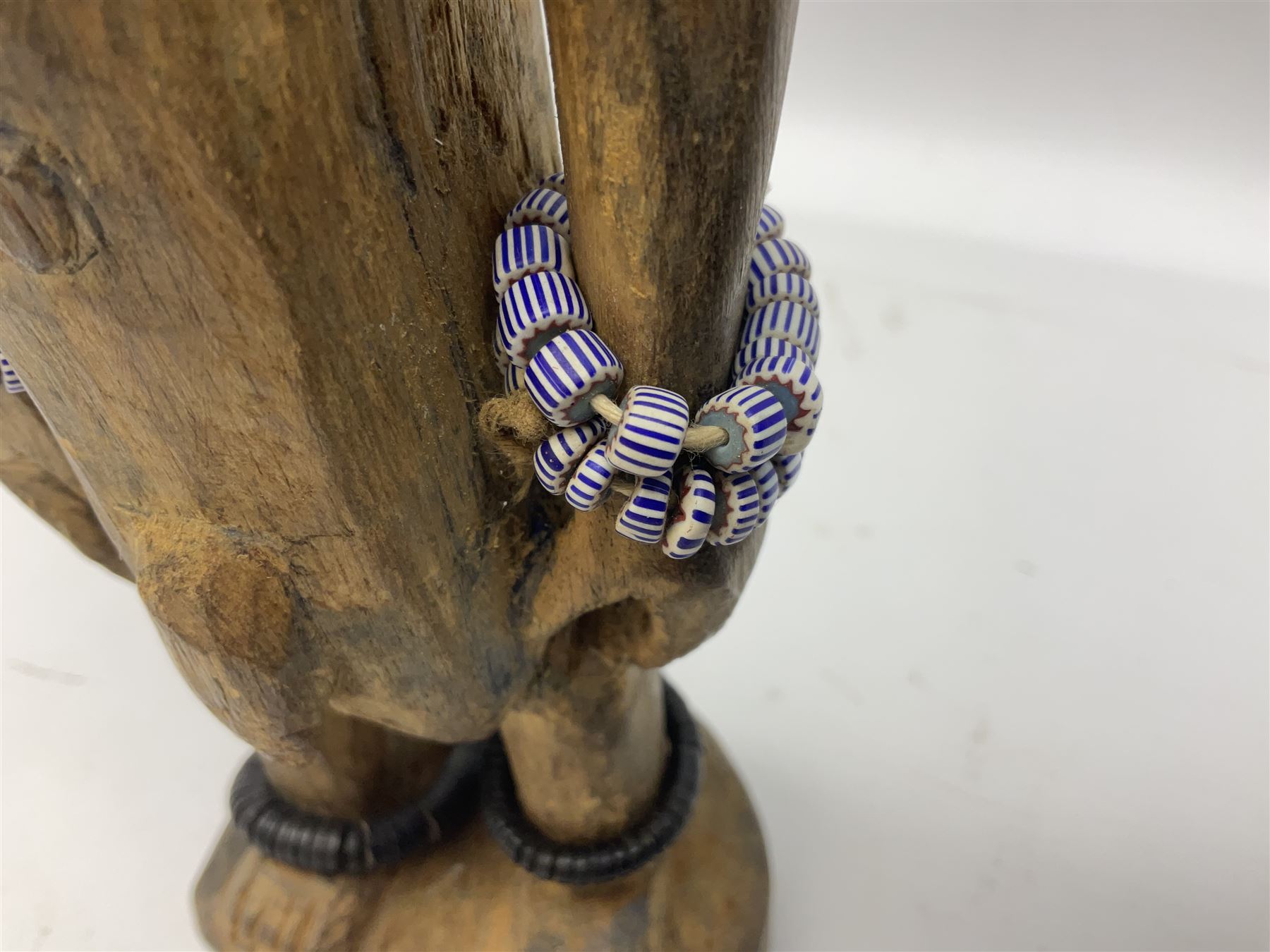 Early 20th century West African Yoruba family wooden figure of Orisha Oko, the god of farming/agriculture, carved from the solid, bears manuscript label of provenance verso H26.5cm