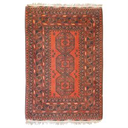 Bokhara red ground rug, the field decorated with three Gul motifs, within multiple borders with repeating geometric patterns (146cm x 103cm); together with an Afghan rug (144cm x 100cm)