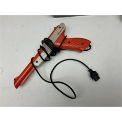 Nintendo Entertainment System (1985) console with two controllers, accessories and instruction booklet. NES Games ‘Duck Hunt’ with Nintendo Zapper gun, ‘Pinball’ and ‘Super Mario Bros.’, all with original sleeves and instruction booklets. NES game ‘Super Mario Bros. 2’ cartridge only