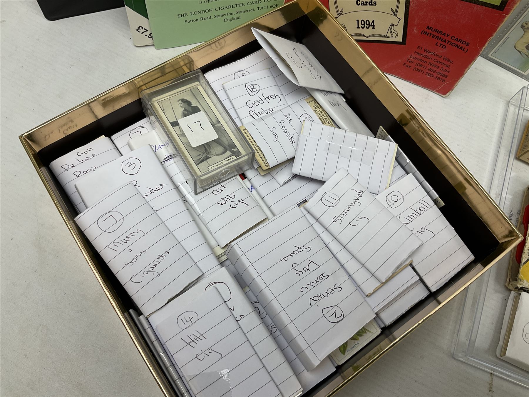 Quantity of mostly cigarette cards, housed in ring binder albums and loose, by Ardath, W.D. & H.O. Wills, John Player & Sons, The American Tobacco Co etc, including famous film stars, cinema stars, wild birds, poultry, dogs etc and various books or catalogues relating to cigarette card collecting, in one box