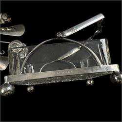 Silver handled button hooks and shoe horns, cut glass jar with silver lid, two silver spoons and an EPNS glass serving dish 