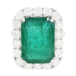 18ct white gold octagonal cut emerald and round brilliant cut diamond cluster ring, stamped, emerald approx 10.05 carat, total diamond weight approx 1.85 carat
