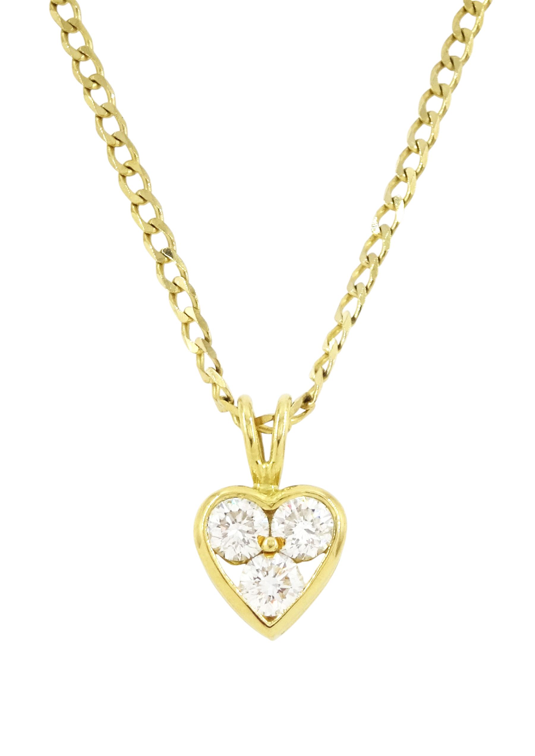 18ct gold diamond heart shaped pendant, three round brilliant cut diamonds of approx 0.55 carat, on 9ct gold flattened curb link chain necklace, both hallmarked