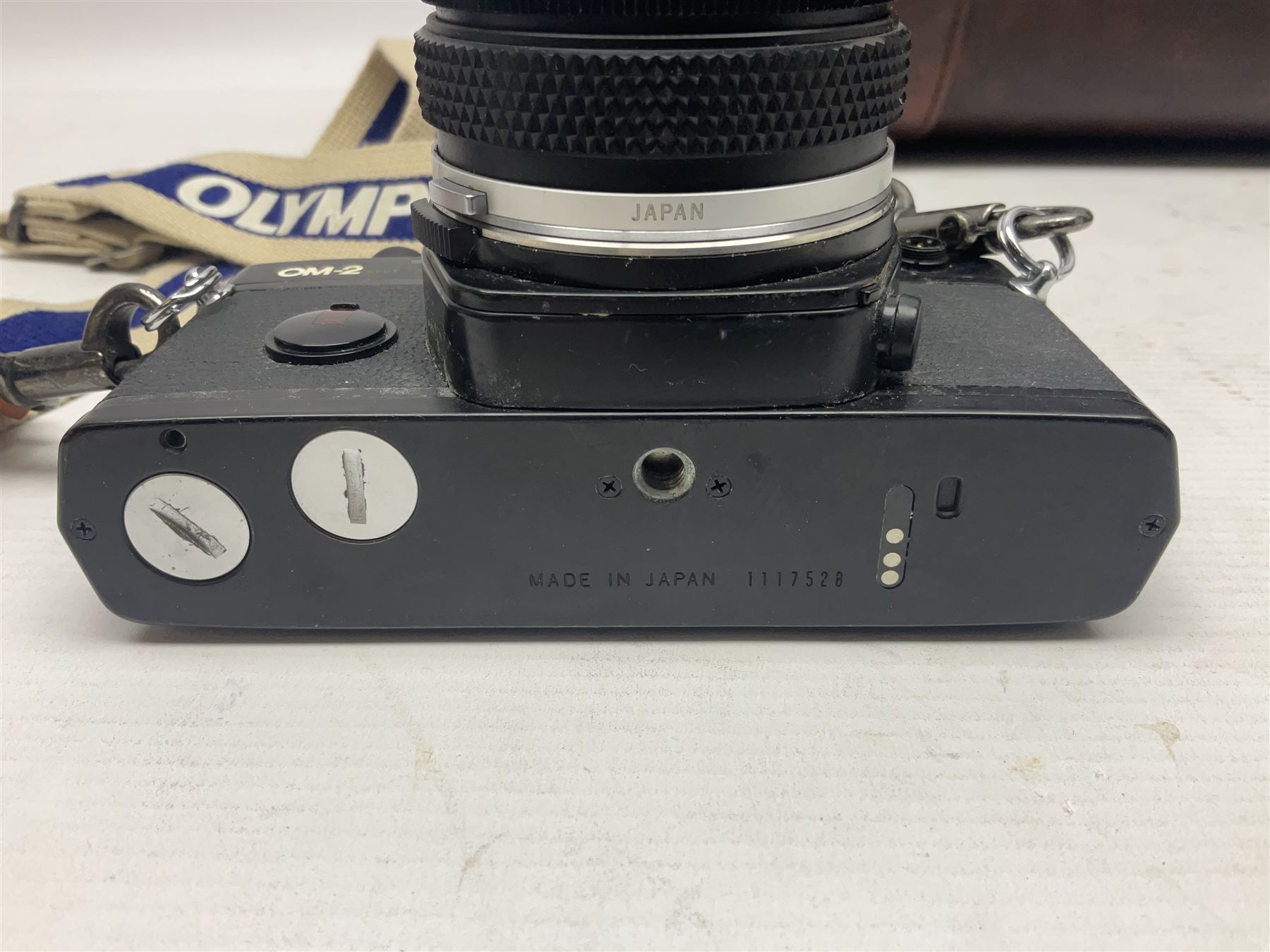 Olympus OM-2 camera body, serial no 1117526, with Olympus OM-System Zuiko Auto-W 28mm 1:2.8'  lens serial no 336591, Olympus OM10 camera body serial no 2392257, with Olympus OM-System Zuiko Auto-Macro 50mm 1:3.5' lens serial no 225784, Soligor C/D mirror lens 1:8 f=500mm' serial no 784035650 together with other camera equipment 