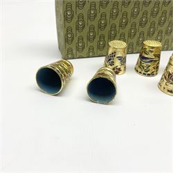 Ten cloisonné thimbles, decorated with, flowers, birds and butterflies