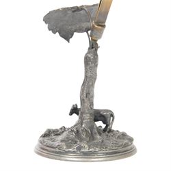 19th century silver plated desk holder, the circular naturalistically modelled base cast with fruiting vines and with applied figure of a ram, rising to a vine with two leaves, and initialled brass clip, H18cm