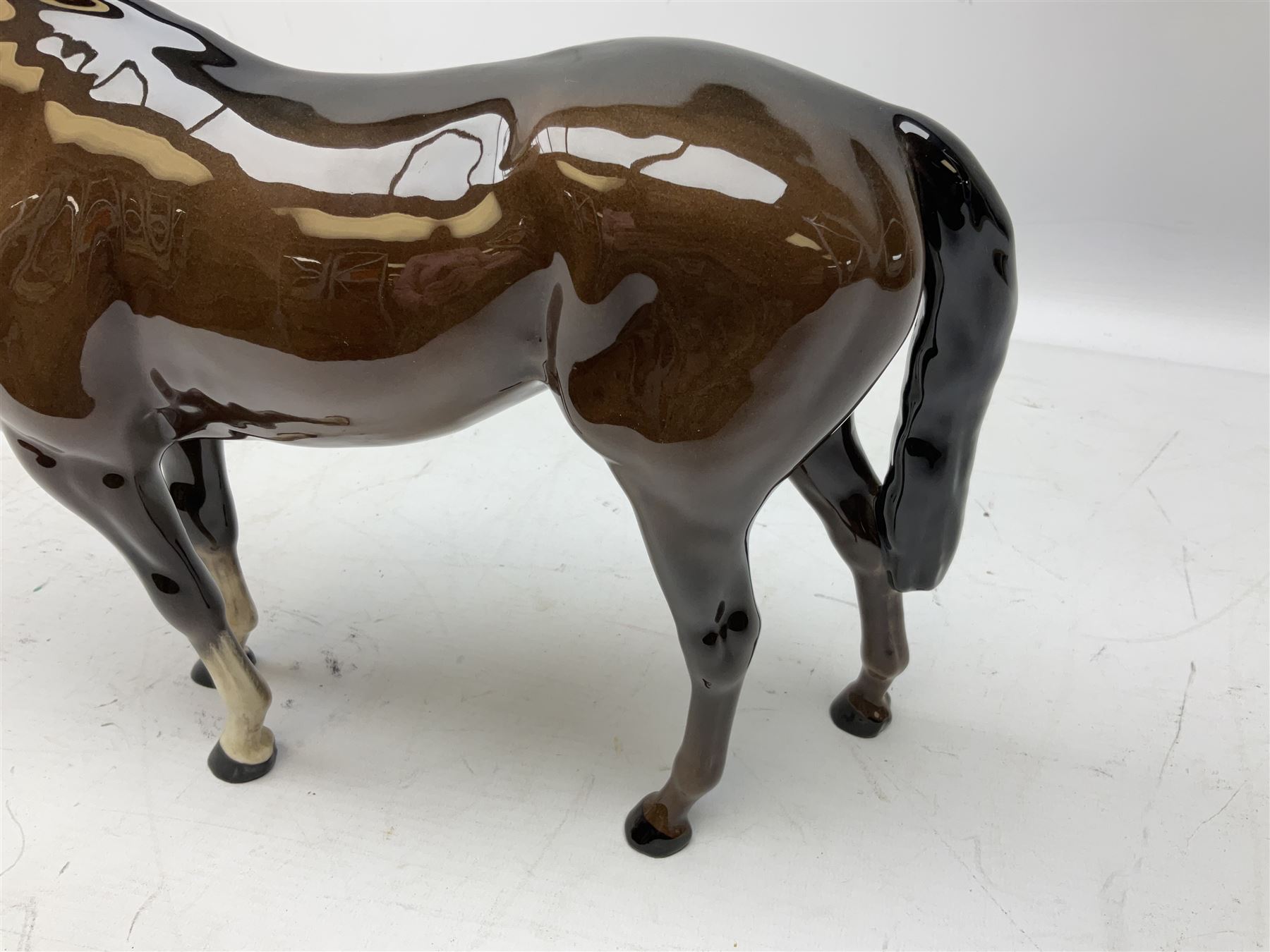 Six Beswick figures of bay horses, including large hunter no.1734, Shire horse no.818, horse with tucked head no.1549, etc (6)
