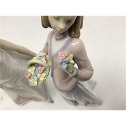 Two Lladro figures, comprising Afternoon Promenade no 7636 and Innocence in Bloom no 7644, tallest example H26cm
