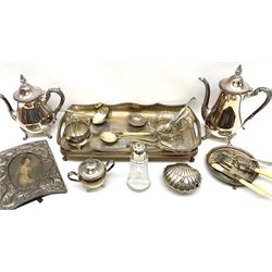 Chinese silver plated photograph frame, decorated in relief with dragons, H24.5cm L18cm, aperture H15cm L10.5cm, together with a group of silver plate, to include two handled tray with pierced gallery, upon four claw feet, Viners four piece tea set, small selection of flatware, etc. 