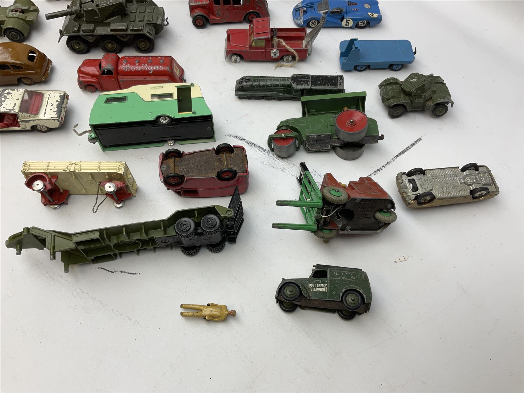 Dinky/Corgi - twenty-nine unboxed and playworn die-cast models including Mobilgas Tanker, two BEV Trucks, Aveling-Barford steam roller, Coventry Climax fork-lift, Hudson Hornet, Vanguard, Post Office Telephones Van, Royal Mail Van etc