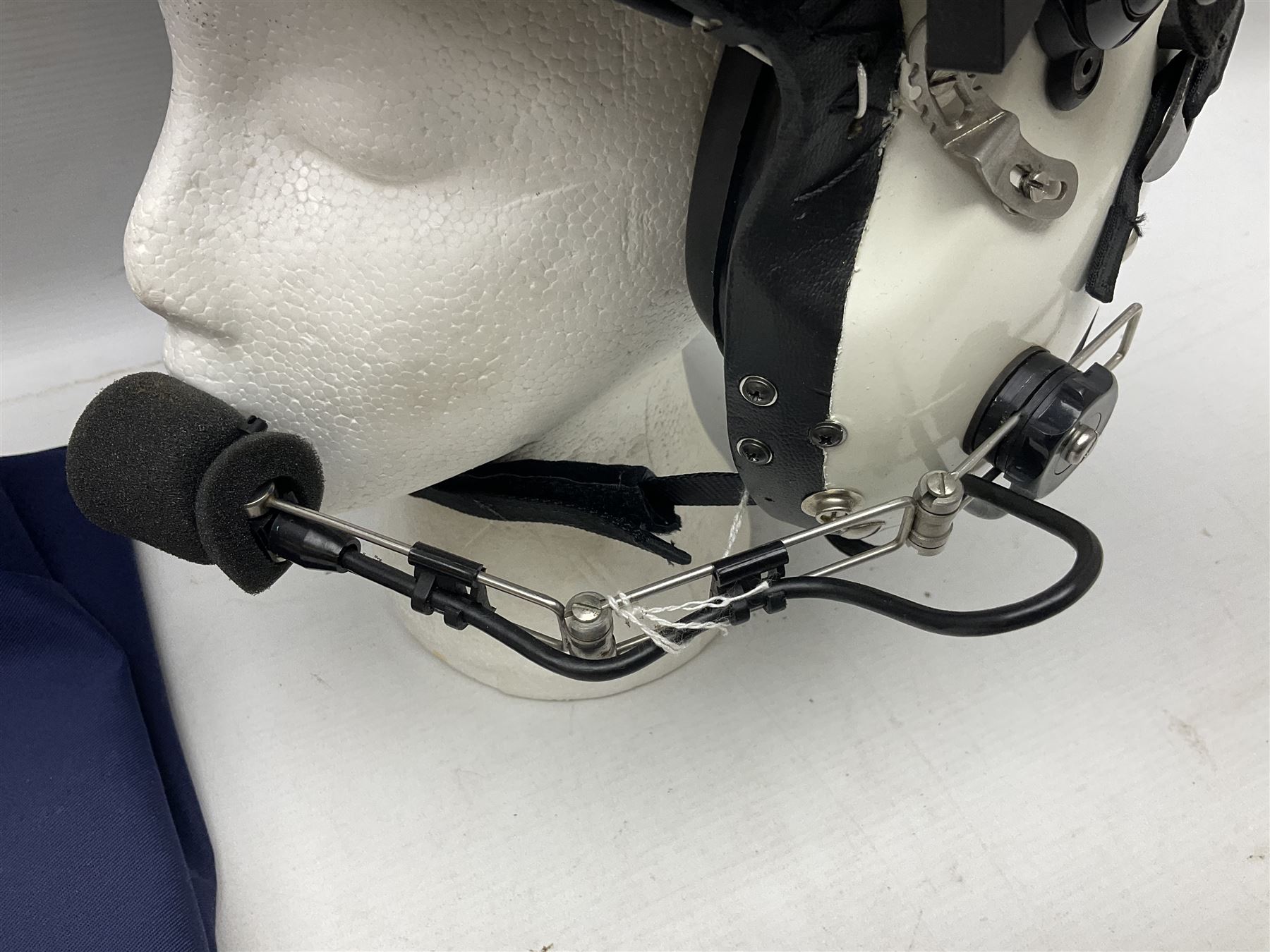 RAF Alpha MK 4 helicopter pilot's flying helmet, finished in white for civilian/rescue service use; reconditioned and avionics tested as working; black cloth cover to visor; fitted with boom microphone; medium size; in blue cloth carrying bag