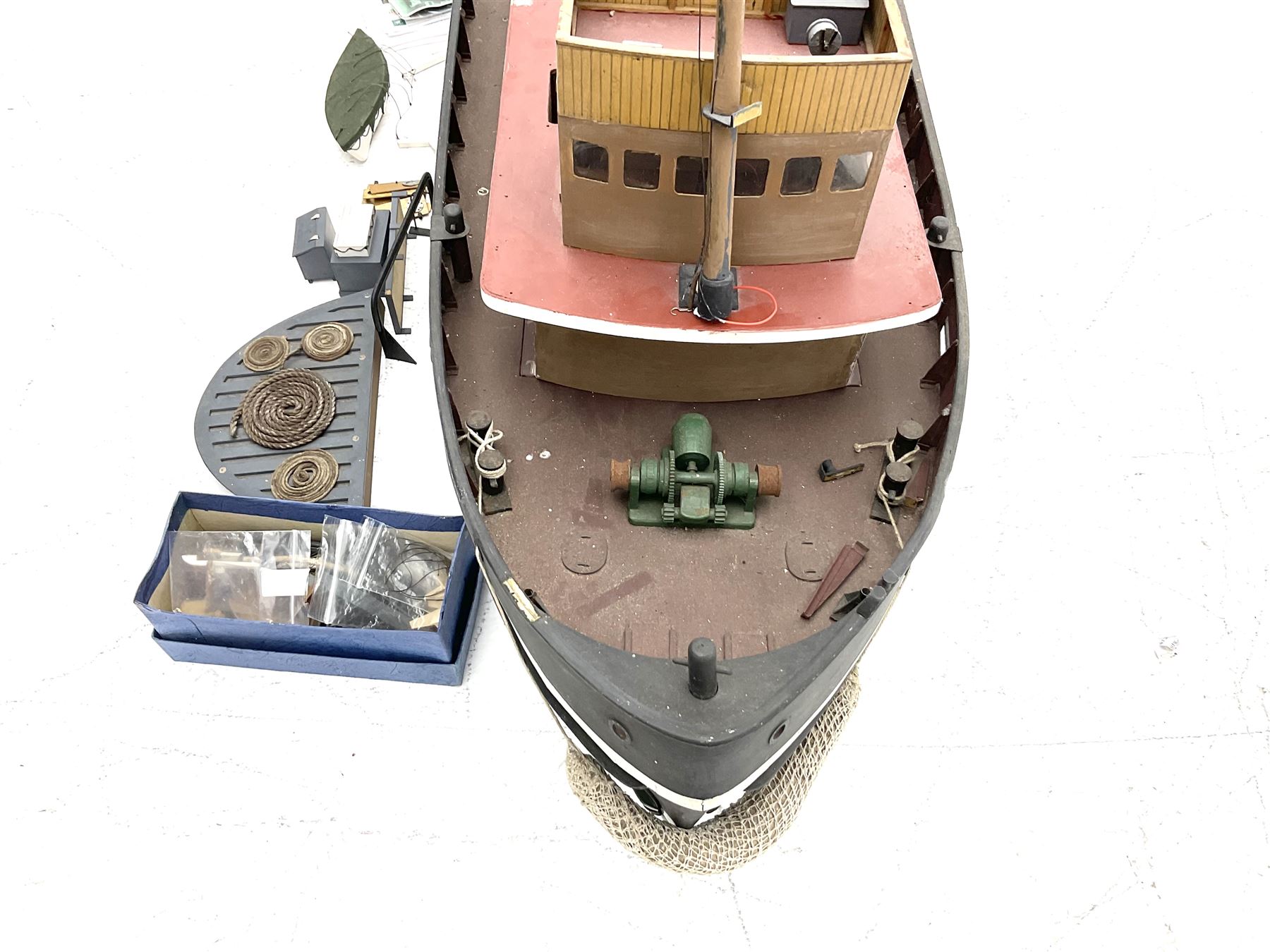 Large model of the tugboat 'Dhulia' on a wooden stand L144cm, together with a box of additional parts and plans