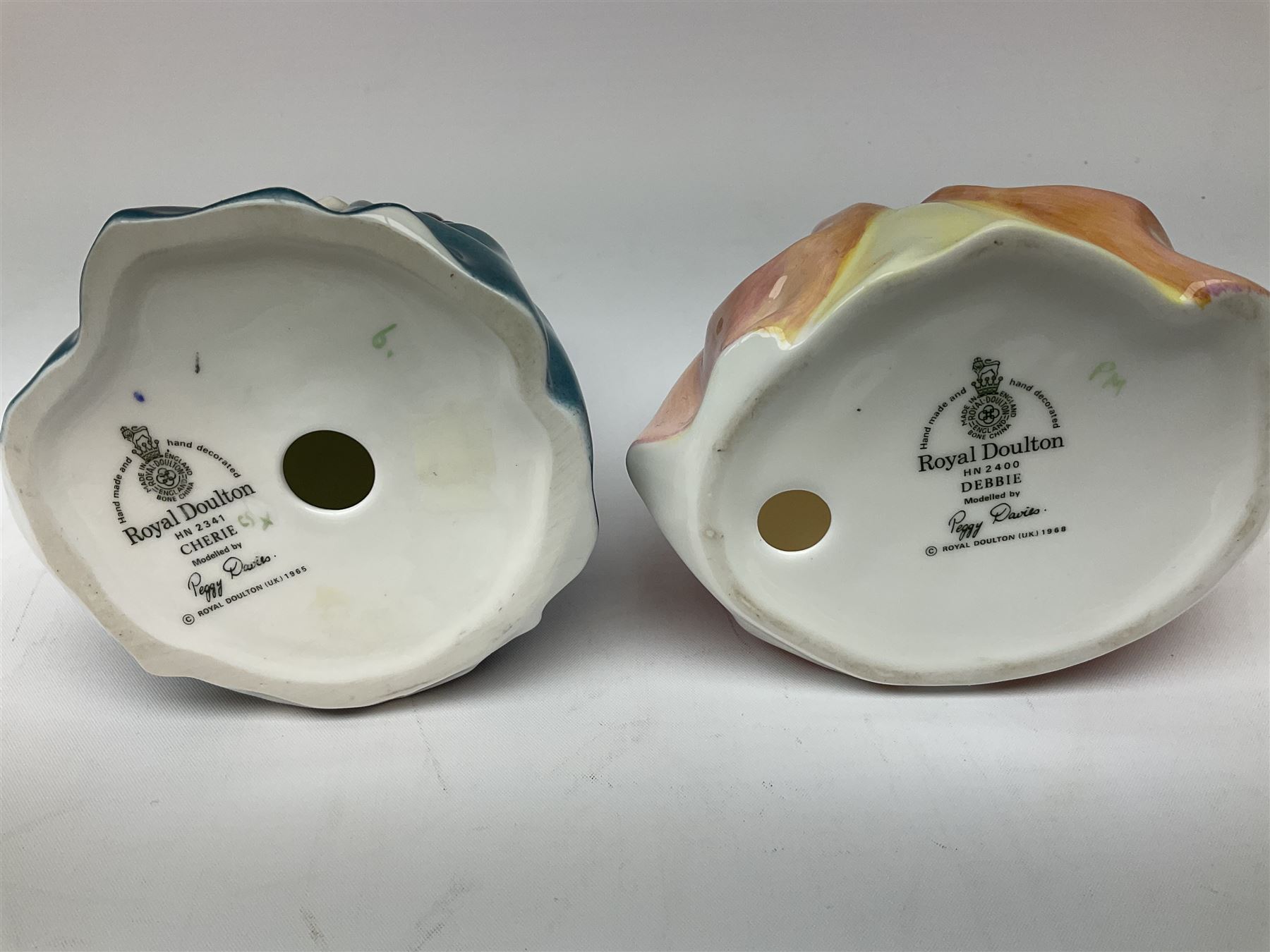 Royal Doulton Peggy Davies collection figures including Cherie HN2341, Debbie HN2400 and Royal Doulton miniature figures, Kirsty HN3213, Sunday Best HN3218, Sara HN3219, Ninette HN3215, Buttercup HN3908 and Fragrance HN3220.