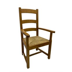 Set of six light oak dining chairs, with rush seats