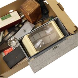 Carriage clock in brass and bevelled glass case and outer leather travelling case, stereo viewer, box of Dr Wells Stereoscopic Charts, large Monarch magnifying glass and other optical items