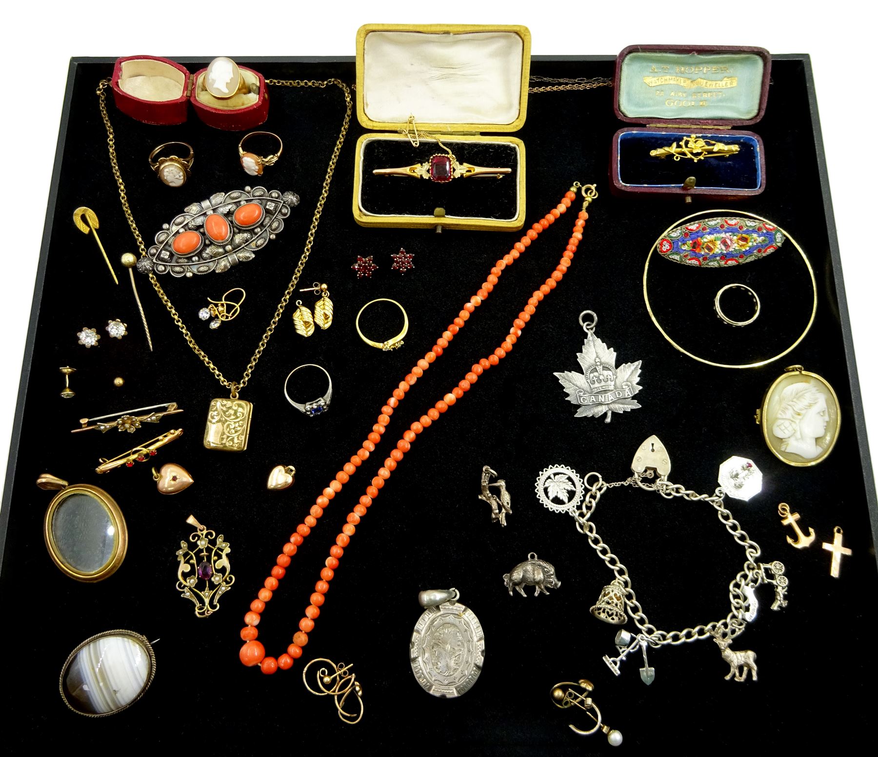 Victorian and later jewellery including coral bead necklace, 18ct gold diamond ring, 9ct gold brooches, gold amethyst pendant, pair of gold garnet earrings, 18ct gold cameo ring, 9ct gold cameo rings, silver charm bracelet and a silver Canada pendant