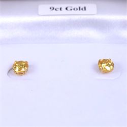 Pair of 9ct gold citrine stud earrings, boxed