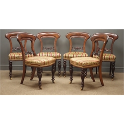  Set six Victorian mahogany dining chairs, shaped cresting rail with carved middle rails, floral upholstered seat, turned and faceted supports  