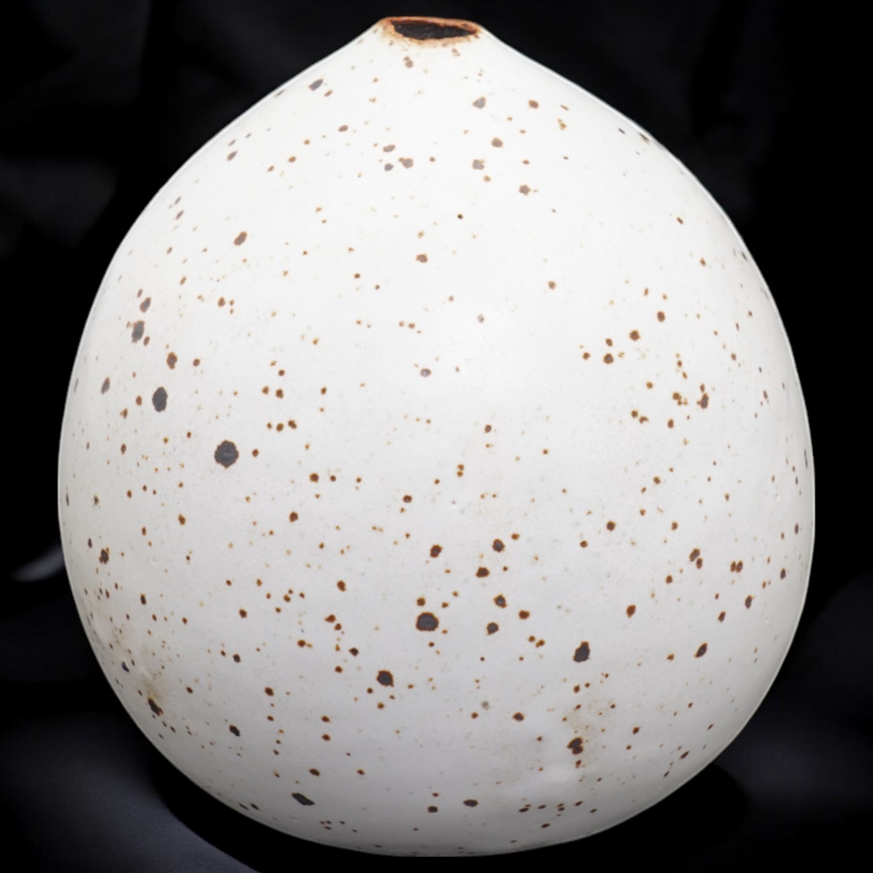 Joanna Constantinidis (1927-2000); studio pottery stoneware posy vase, of ovoid form, in white glaze with brown speckles, impressed C mark to base, H10cm