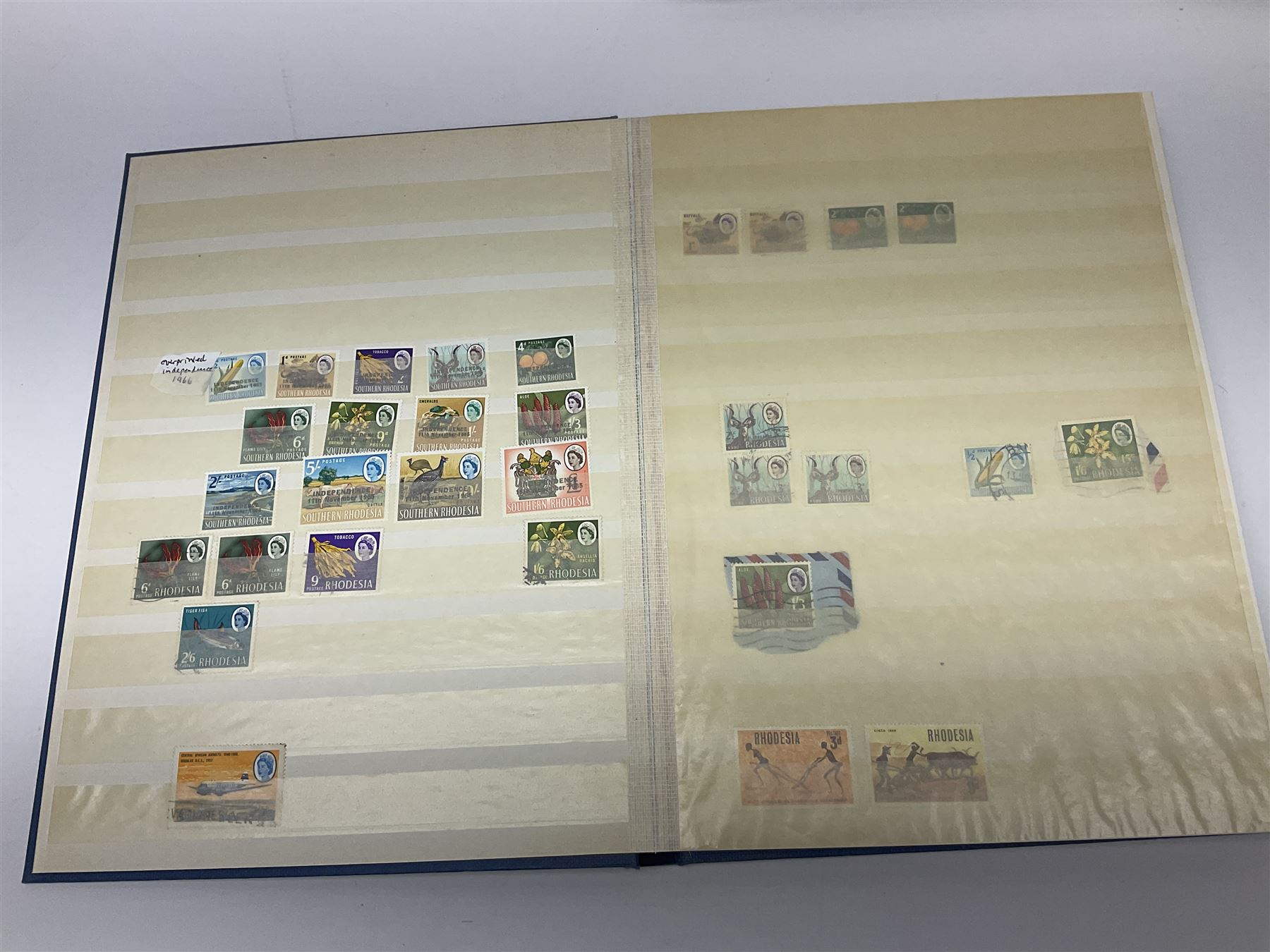 Great British and World stamps, including Queen Elizabeth II mint stamps in presentation packs, PHQ cards, Canada, Rhodesia and Nyasaland etc, in stockbooks and loose