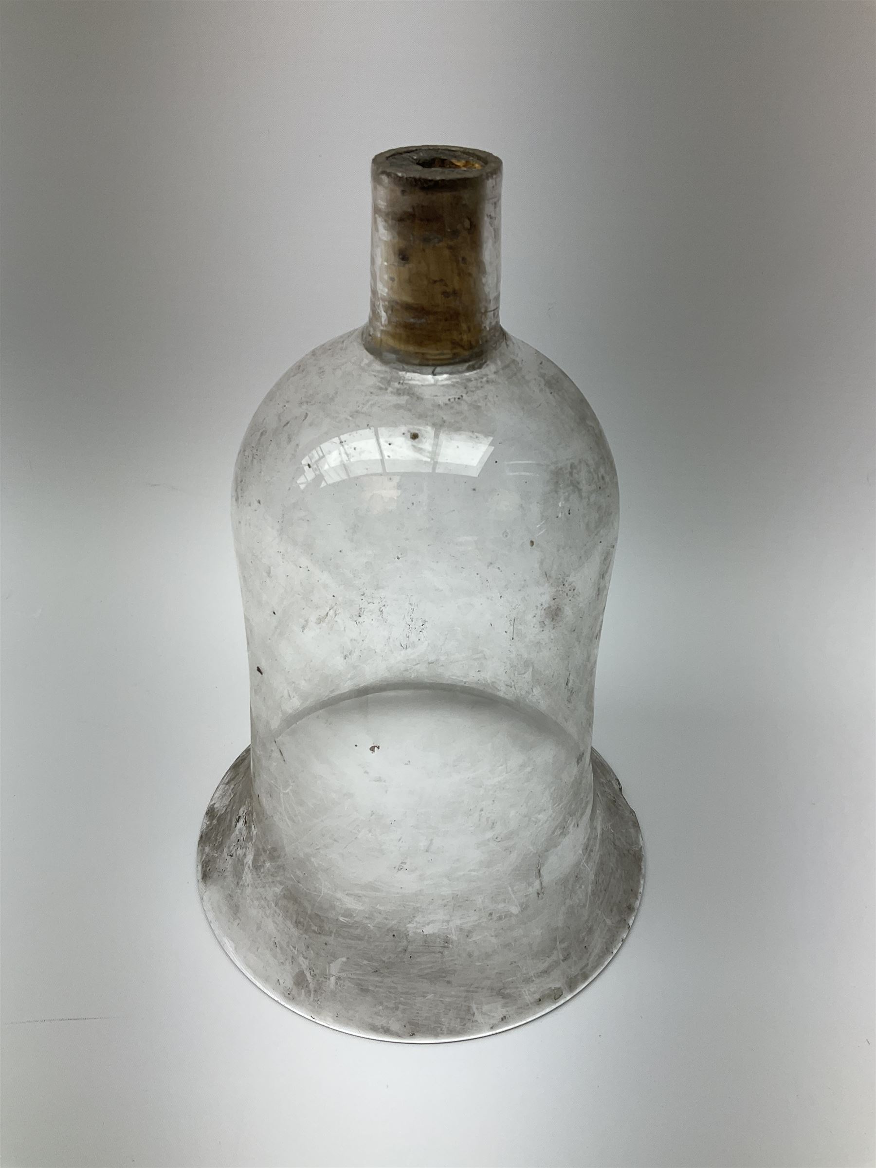 Collection of 19th century and later pharmaceutical laboratory glass, to include, large filter funnel, graham condenser, conical flask, bell jar and another with graduated tube, Provenance: discovered in the storeroom of a long established Hull pharmacist and opticians