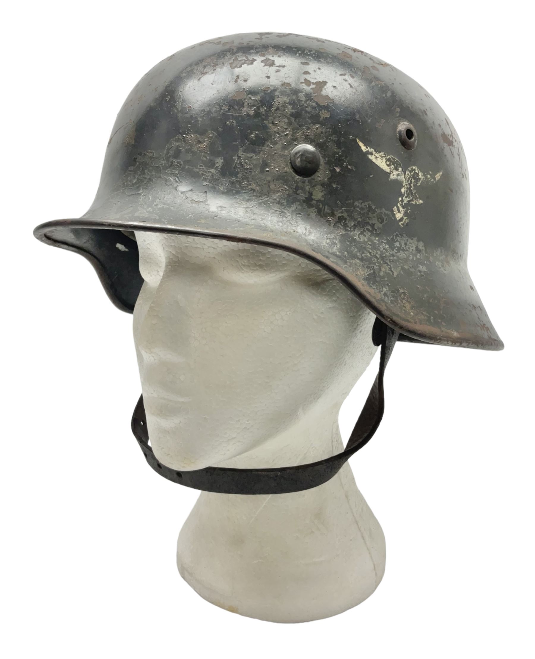 WW2 German Luftwaffe M40 double decal steel helmet with liner and chin strap; impressed 506 to back skirt; indistinct stencil type name(?) to inside