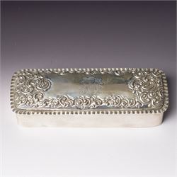 Late Victorian silver dressing table box of rectangular form with embossed hinged lid and ...