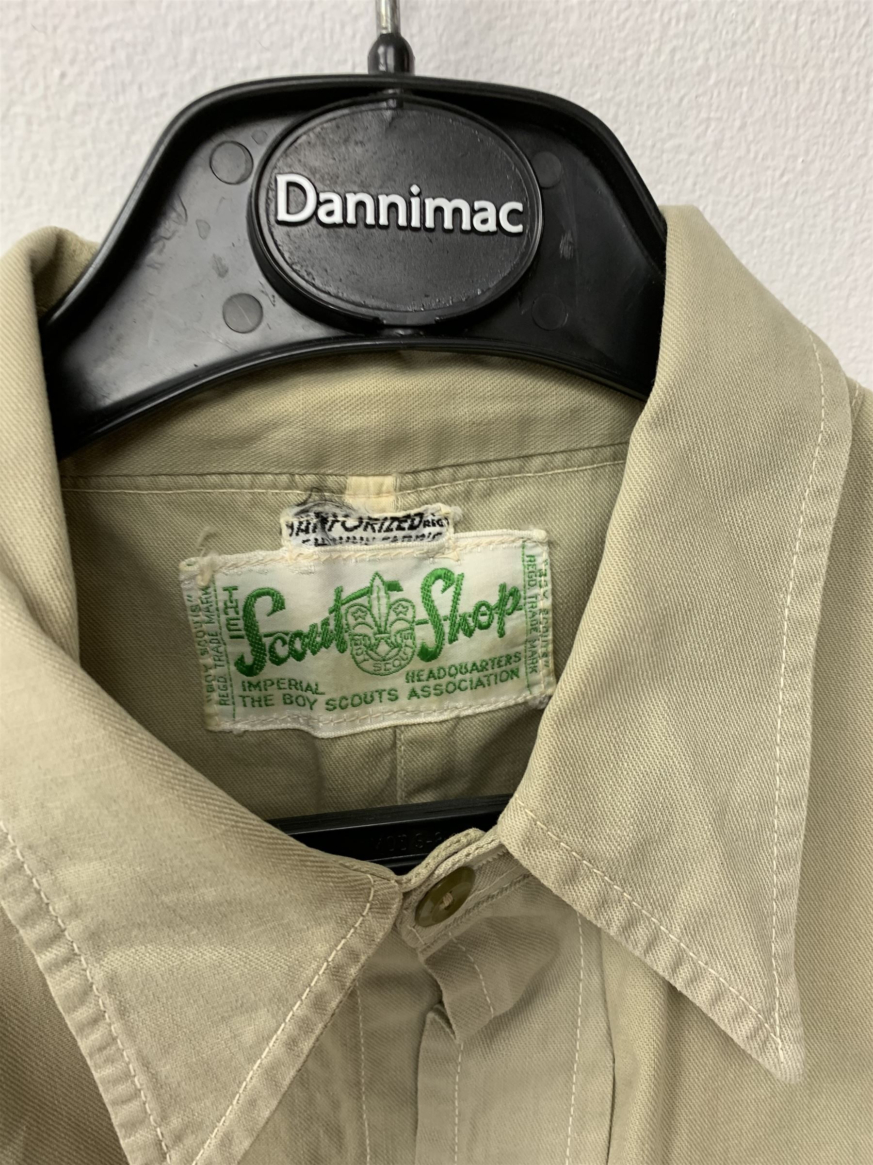 Mid 20th century Boy Scouts uniform, comprising corduroy shorts, further pair of shorts, two shirts, socks, and felt hat, together a framed collection of Ogden's 'Boy Scots' cigarette cards, and an unframed print of Lord Baden Powell. 