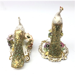  Royal Crown Derby model of a peacock atop a floral encrusted urn, signed C.Till  & J. Plant H24cm together with another peacock atop a floral encrusted bough, signed L. Purdy & J. Plant (2)  