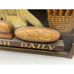 Painted wood panelled sign of a chef in his bakery moulded with loaves of bread titled Marfleet Bakers in cream and green lettering, detailed Fresh Daily, in raised brown frame, L92cm