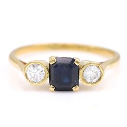 18ct gold sapphire and diamond three stone ring, single octagonal cut sapphire, with a sin...